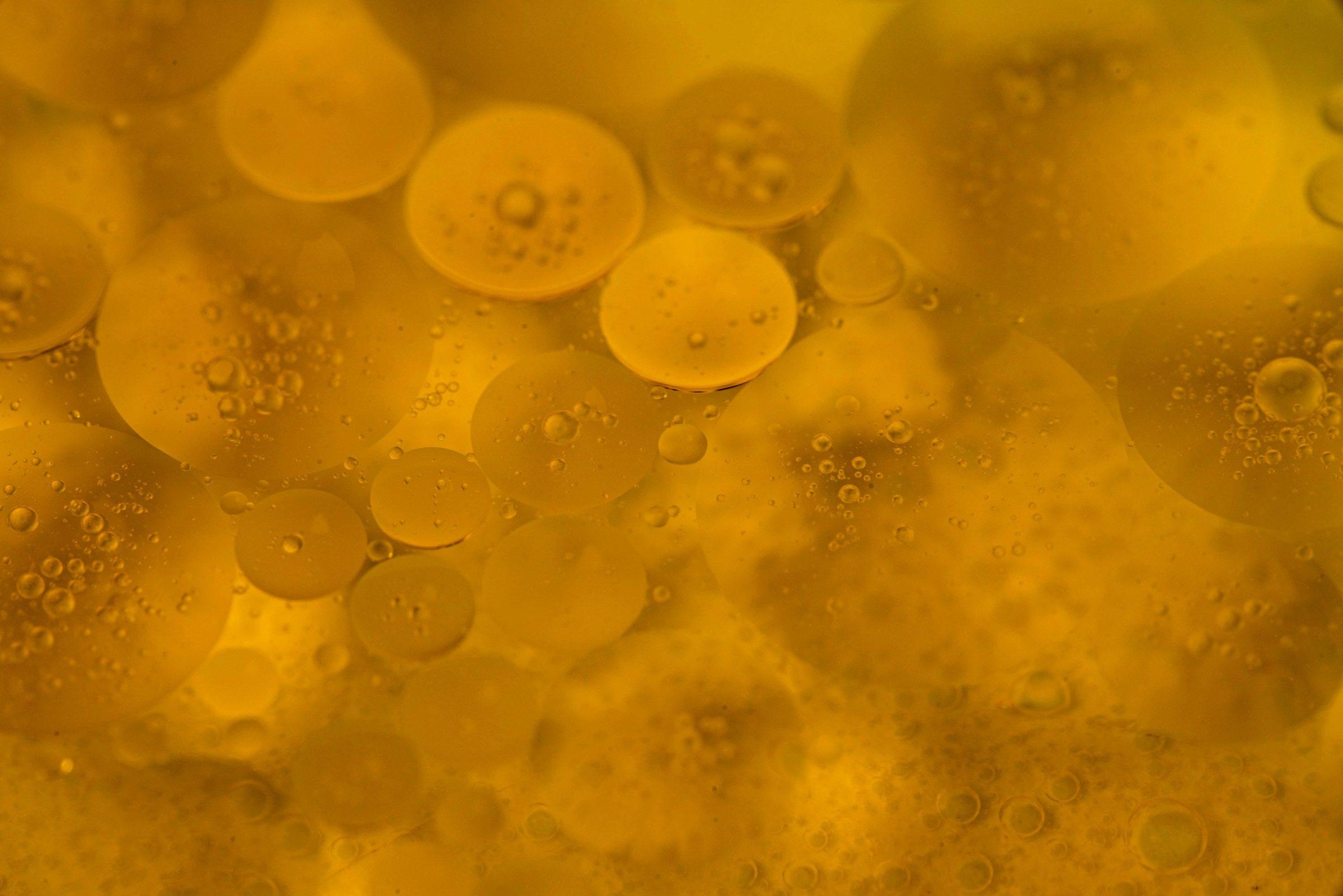 Golden oil bubbles, close up