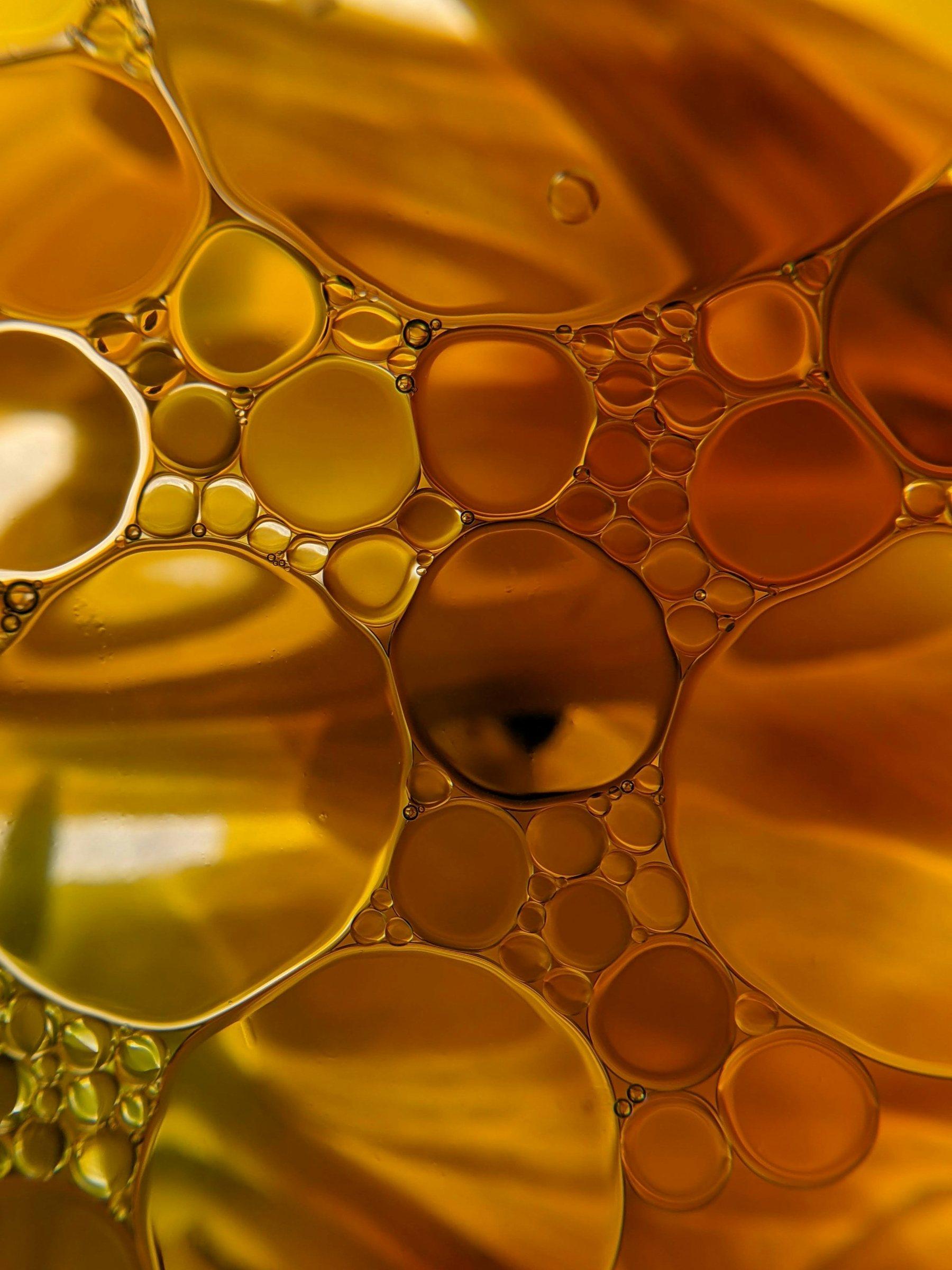 Golden oil bubbles, close up
